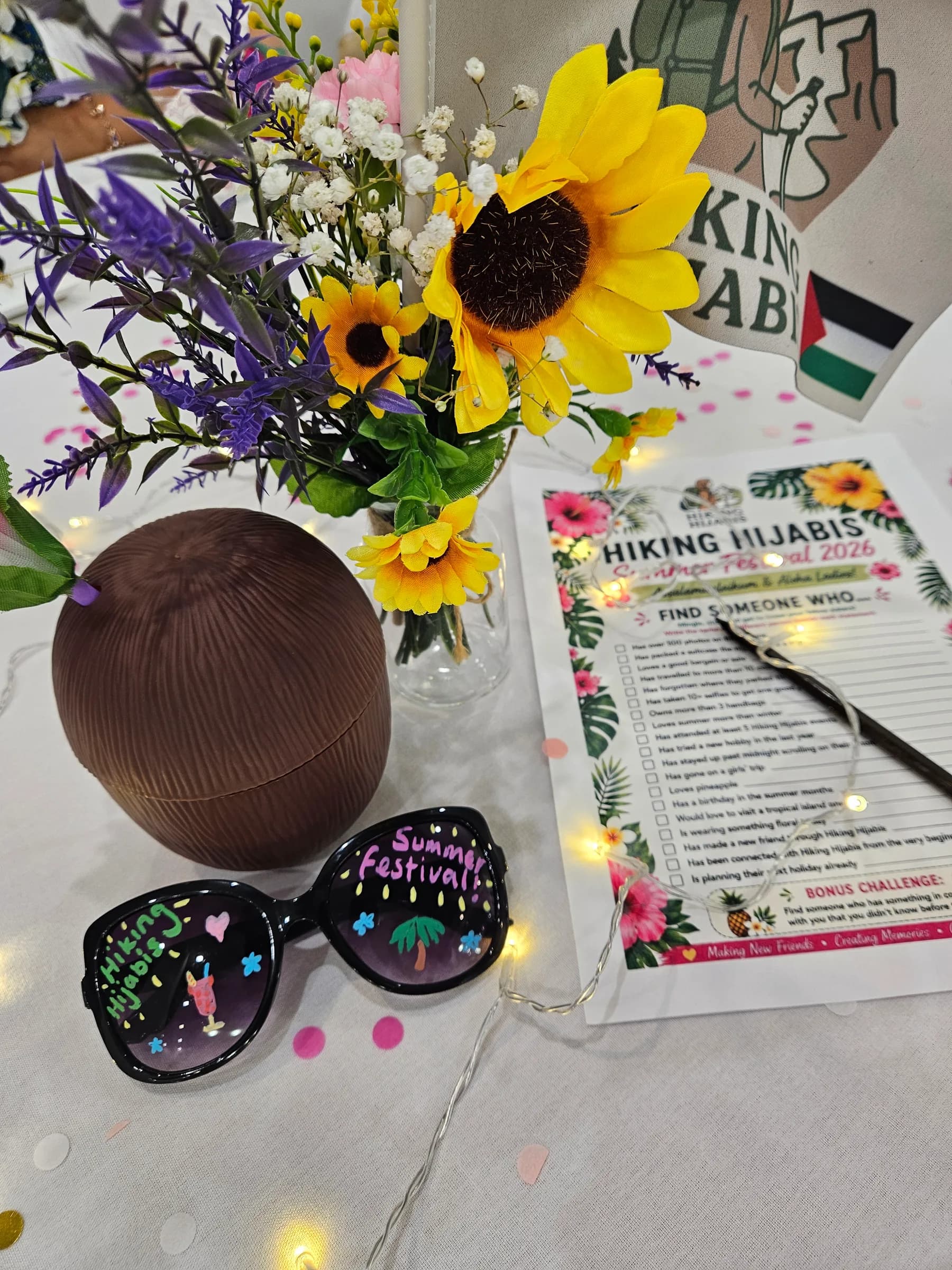Hiking Hijabis sunglasses and a coconut on the table
