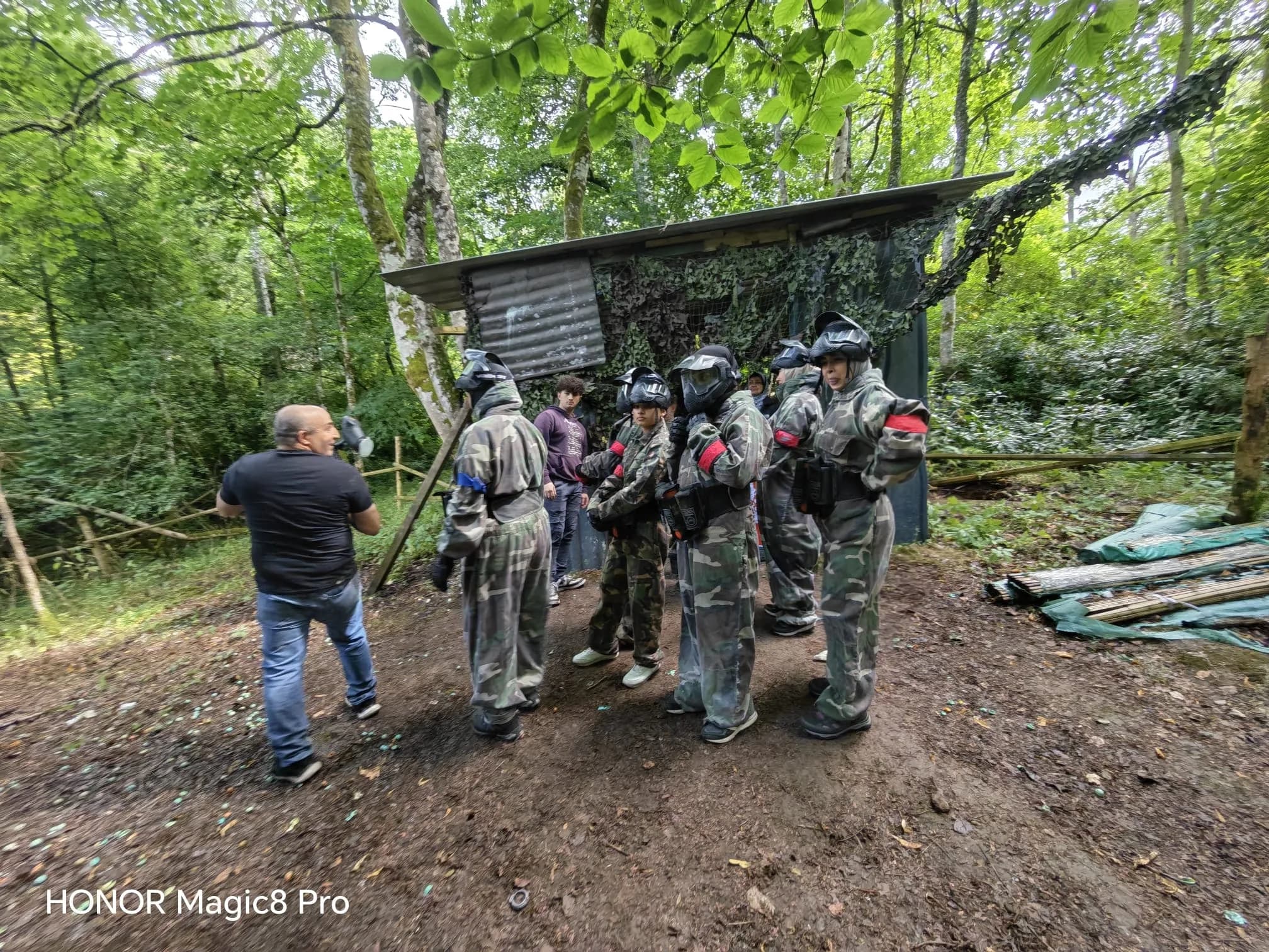 Sisters in protective suits ready for an activity in the forest