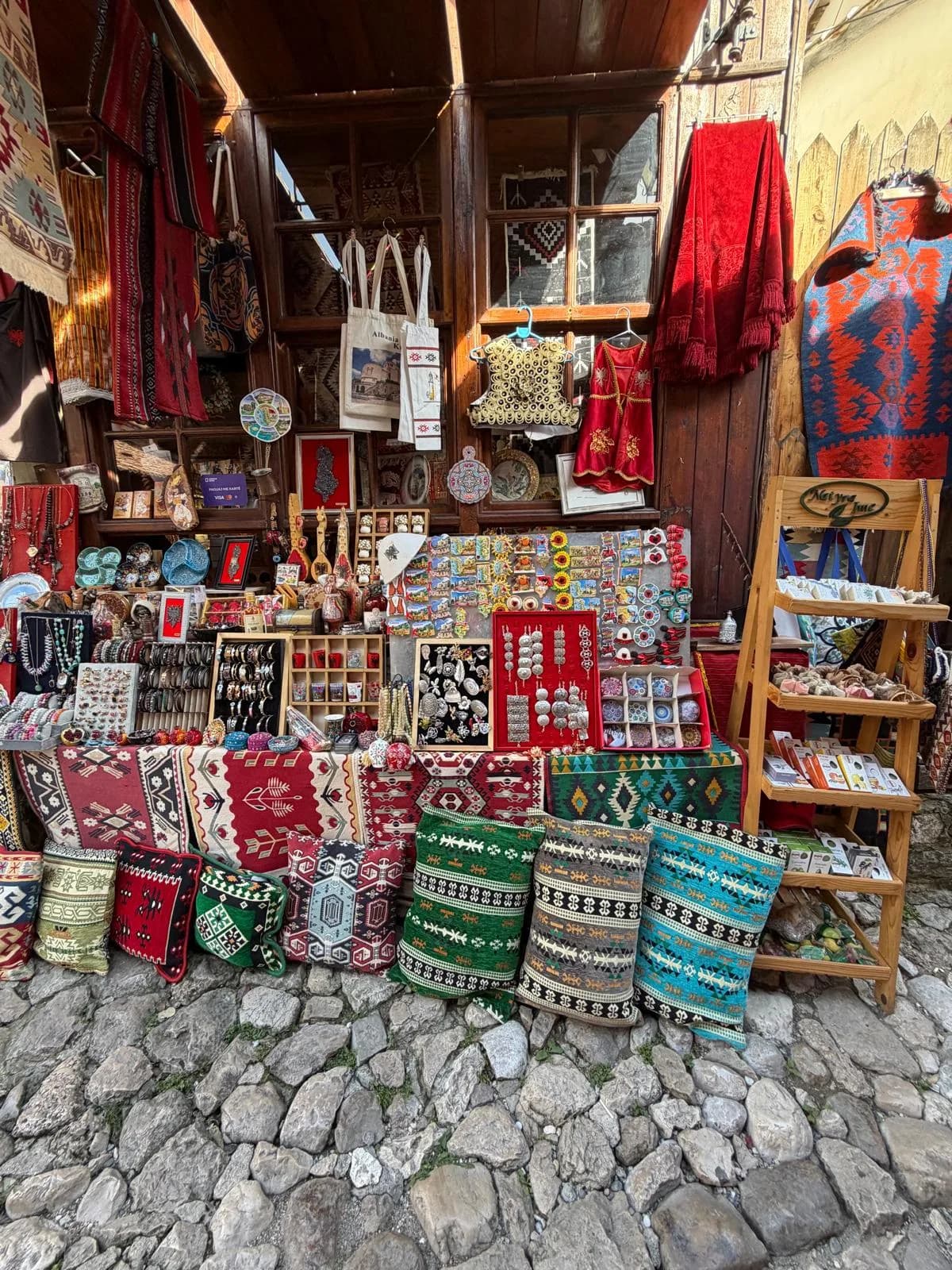 Colourful rugs, bags and textiles at a traditional bazaar