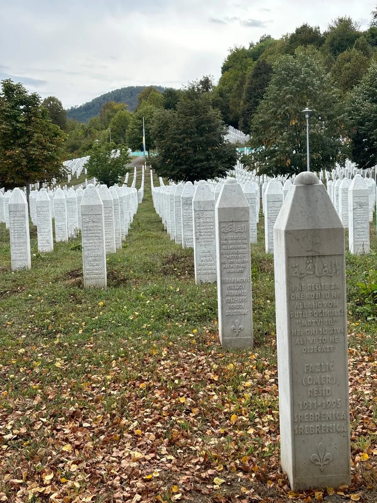 White memorial stones at the Srebrenica–Potočari Memorial