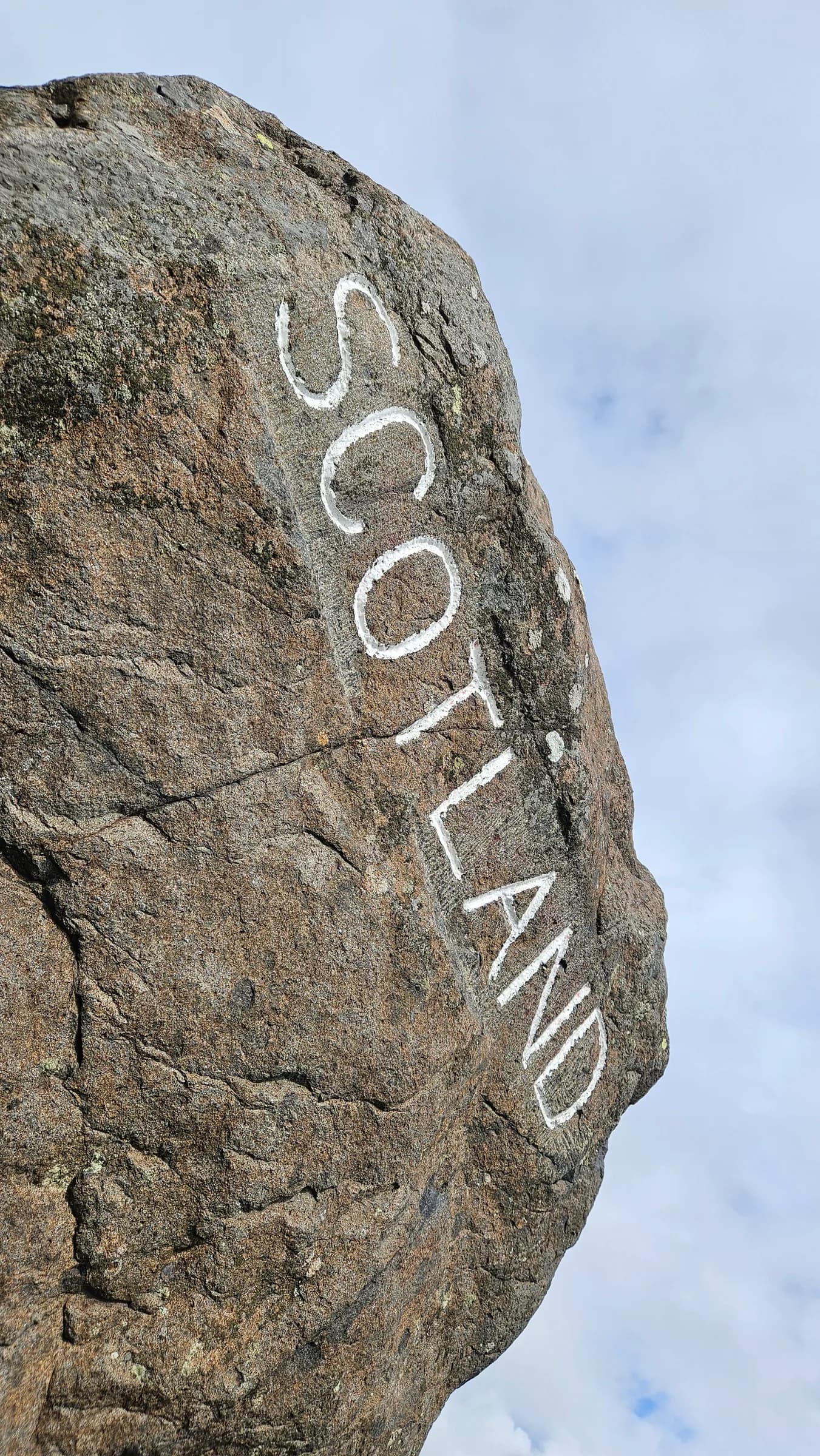 A rock painted with the word Scotland