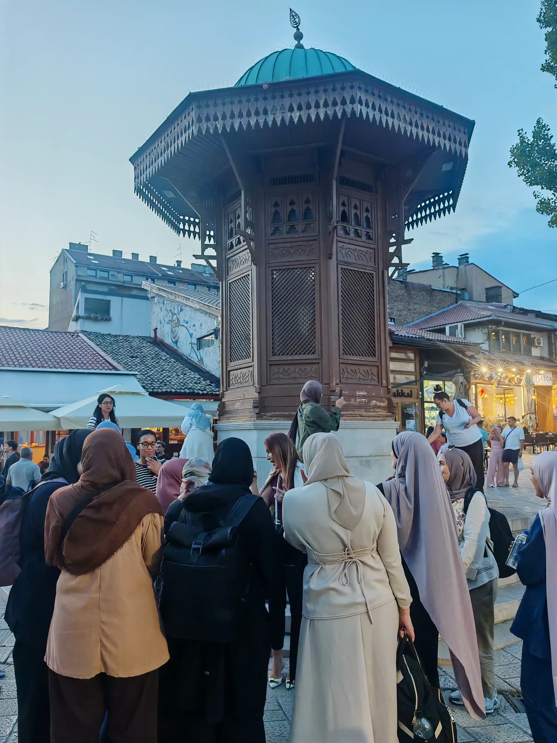 The group gathered by the Sebilj fountain in Sarajevo's Baščaršija