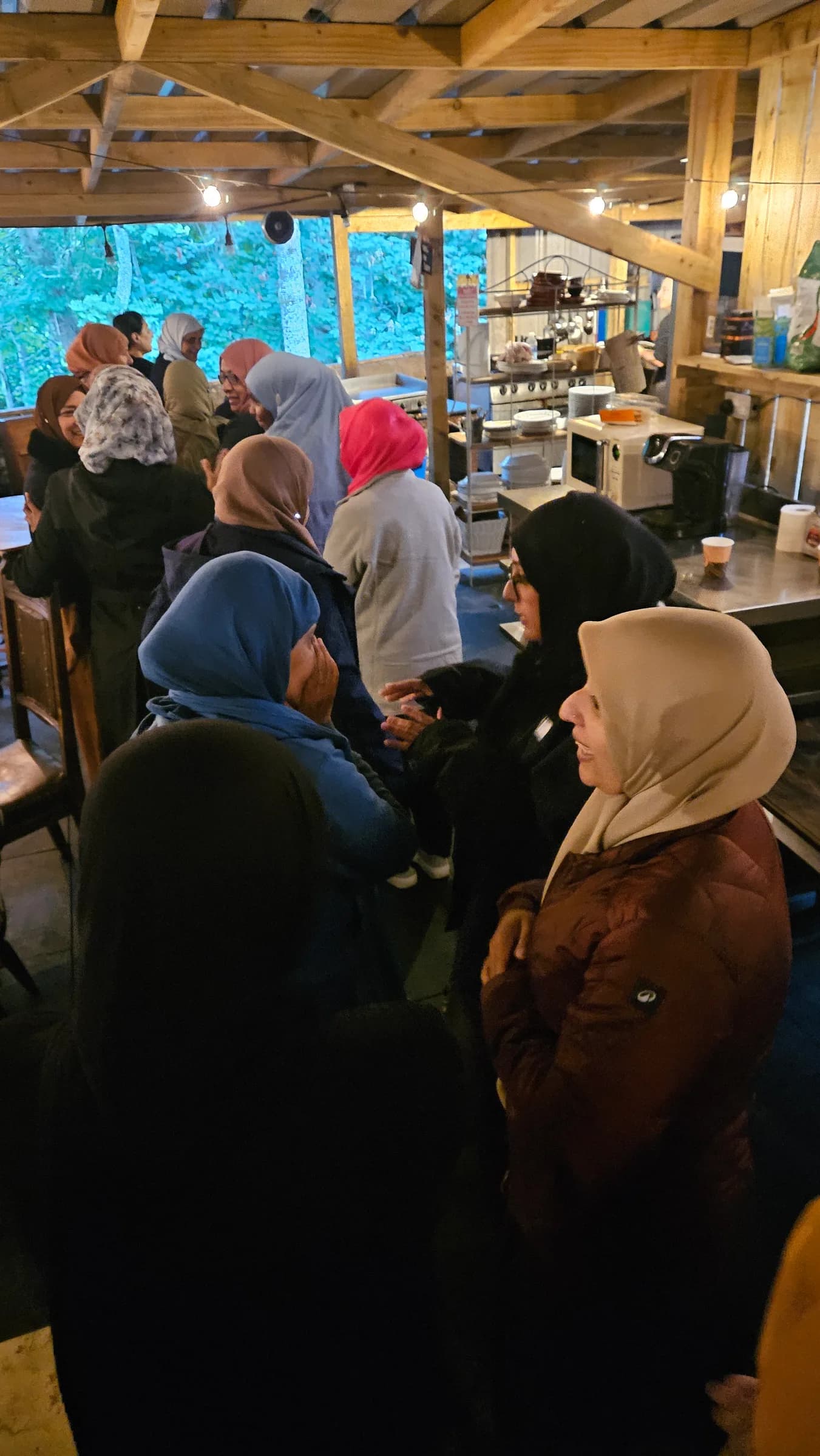 Sisters gathered together indoors in the evening