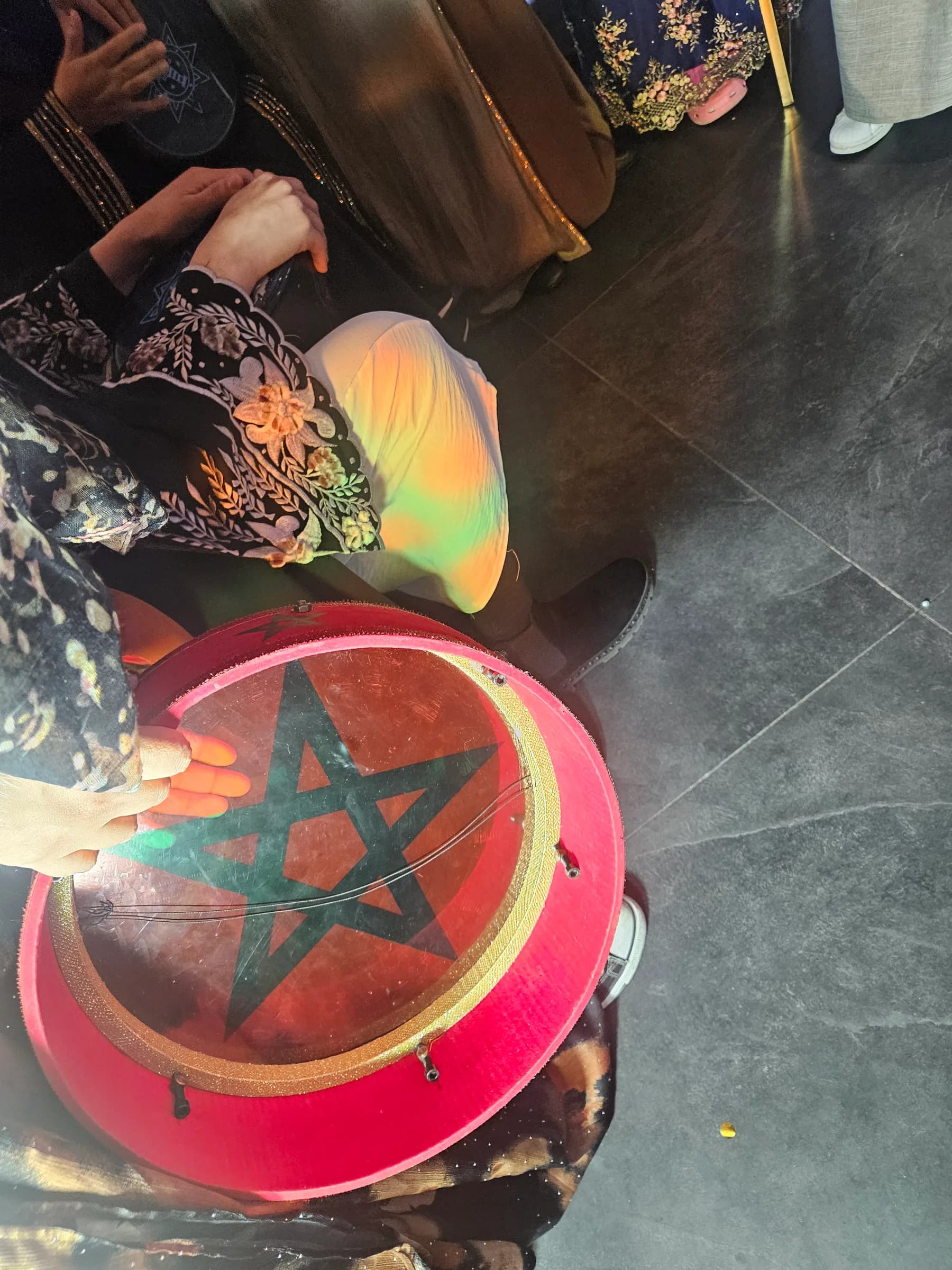 Playing a hand drum