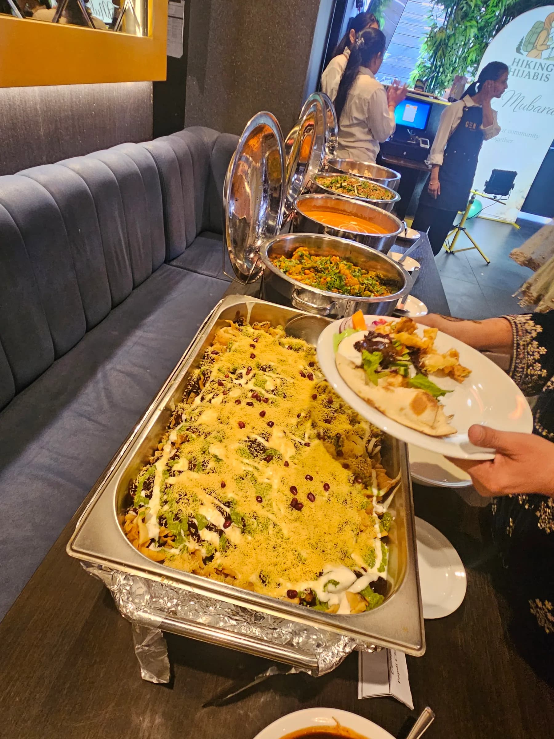 Guests serving themselves from the buffet